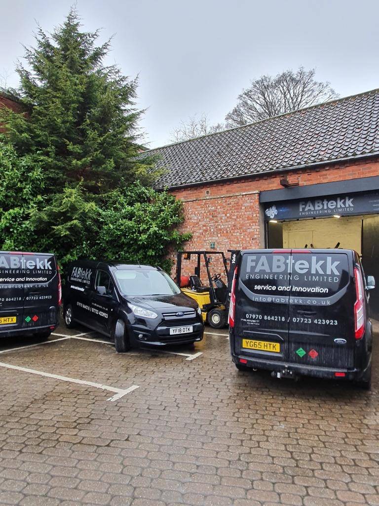FABtekk Engineering vans outside the workshop